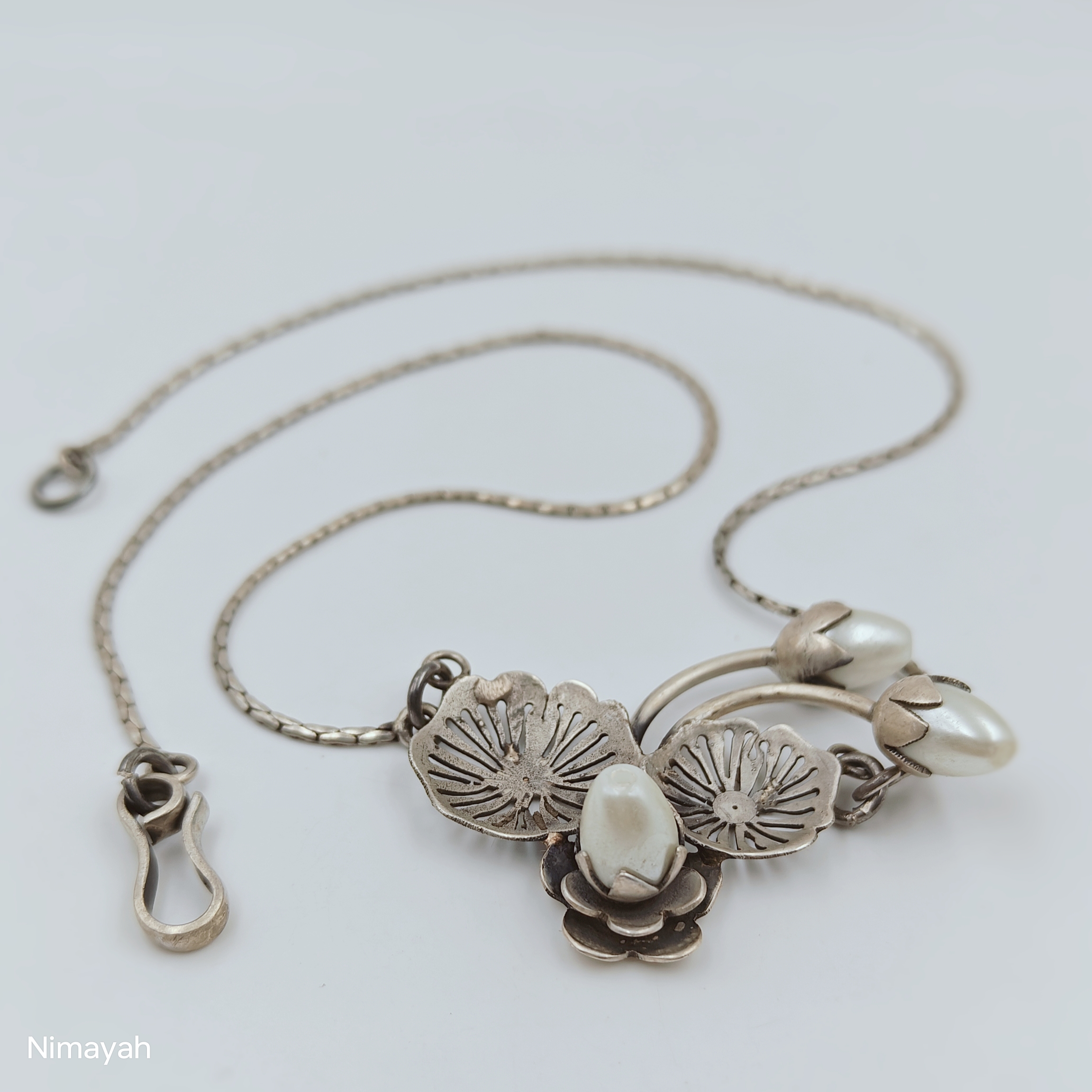 The White Bud Necklace: A Timeless Embrace for the Modern Indian Woman