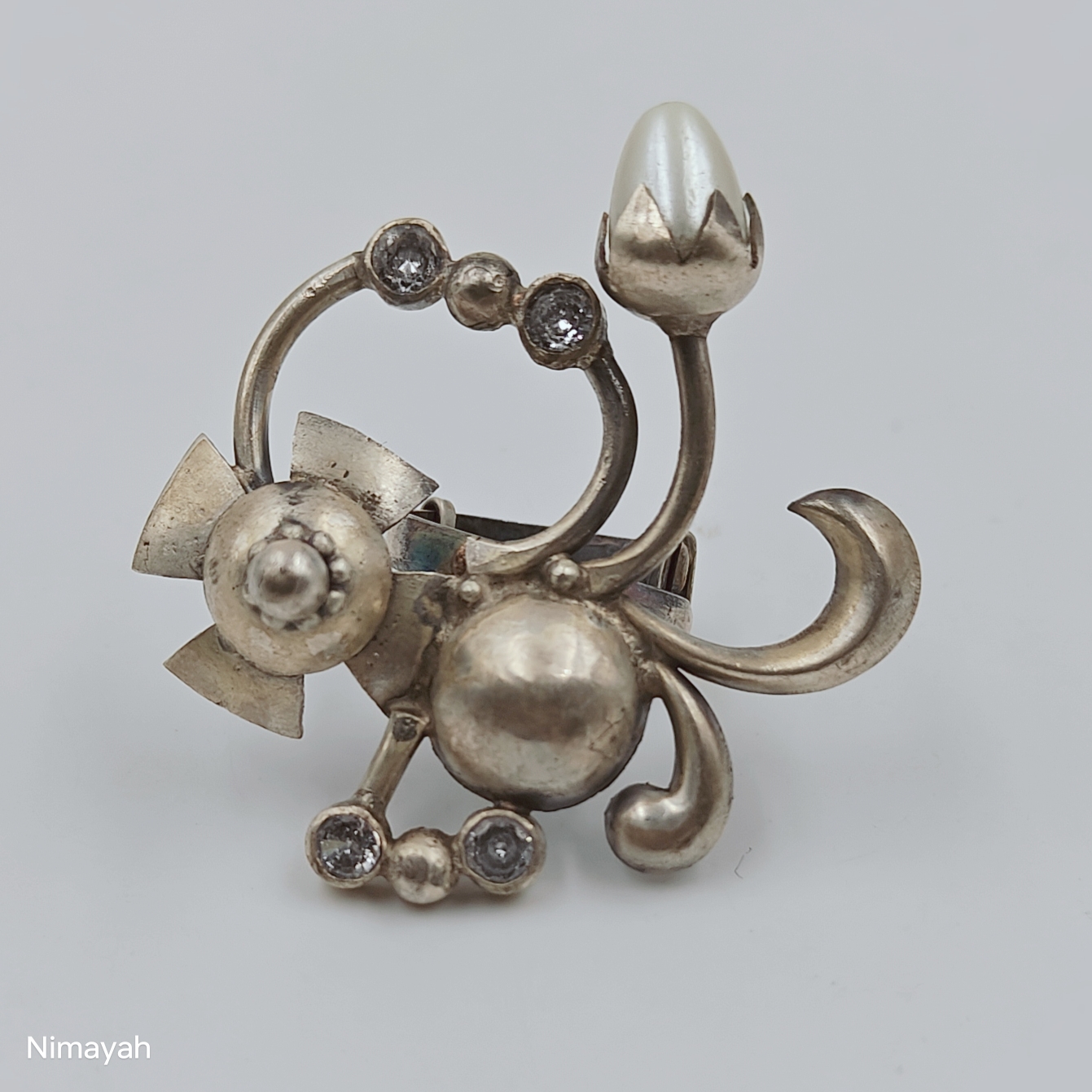 The Timeless Elegance of the White Bud Ring: A Tale of Love and Self-Expression