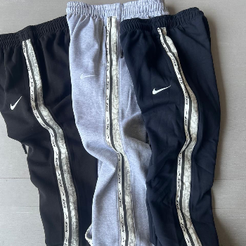 Nike Track Pants-https://s3.ap-south-1.amazonaws.com/prod-media-vyaparify-com/vcards/products/127559/product_1738234549_679b5ab5b85ba.png Image