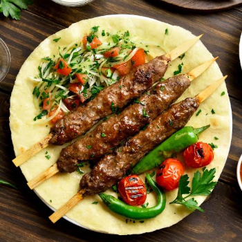 Turkish kabab-https://s3.ap-south-1.amazonaws.com/prod-media-vyaparify-com/vcards/products/149325/product_1740231781_67b9d4653ddef.png Image