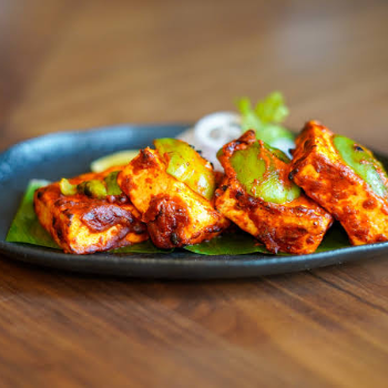 Paneer tikka (half)-https://s3.ap-south-1.amazonaws.com/prod-media-vyaparify-com/vcards/products/149792/product_1740342839_67bb8637dc1a9.png Image