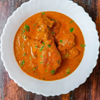 Chicken lababdar (half)-https://s3.ap-south-1.amazonaws.com/prod-media-vyaparify-com/vcards/products/150648/product_1740475123_67bd8af3a8cae.png Image