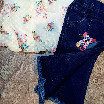 Jeans and top-https://s3.ap-south-1.amazonaws.com/prod-media-vyaparify-com/vcards/products/191005/product_1744889842_6800e7f2492dd.png Image