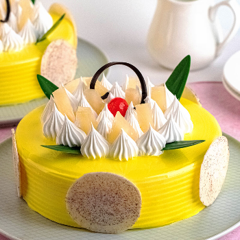 Pineapple cake-https://s3.ap-south-1.amazonaws.com/prod-media-vyaparify-com/vcards/products/191176/product_1744906492_680128fc75dad.png Image