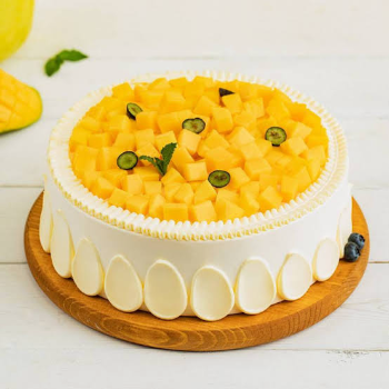Eggless Mango cake-https://s3.ap-south-1.amazonaws.com/prod-media-vyaparify-com/vcards/products/191178/product_1744906897_68012a91e86dc.png Image