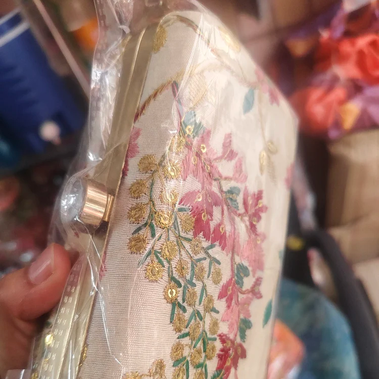 Embroidery Clutch Bags-https://s3.ap-south-1.amazonaws.com/prod-media-vyaparify-com/vcards/products/222873/product_1746874392_681f30182bd07.png Image