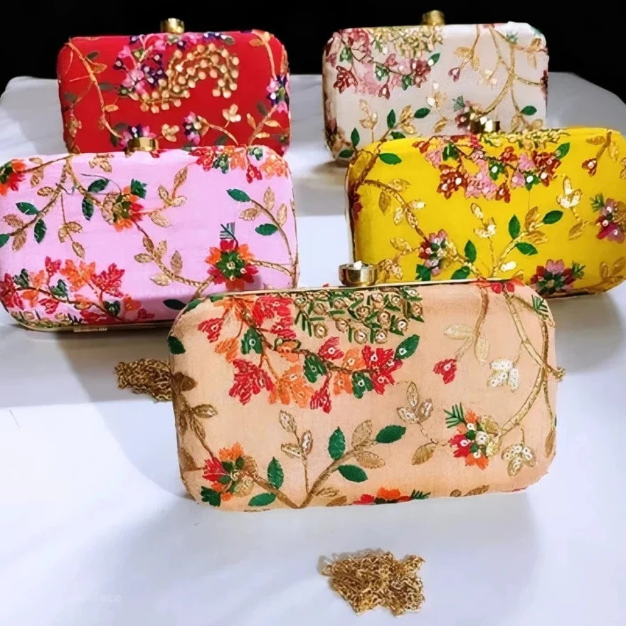 Embroidery Clutch Bags-https://s3.ap-south-1.amazonaws.com/prod-media-vyaparify-com/vcards/products/222875/product_1746874392_681f301857fc3.png Image