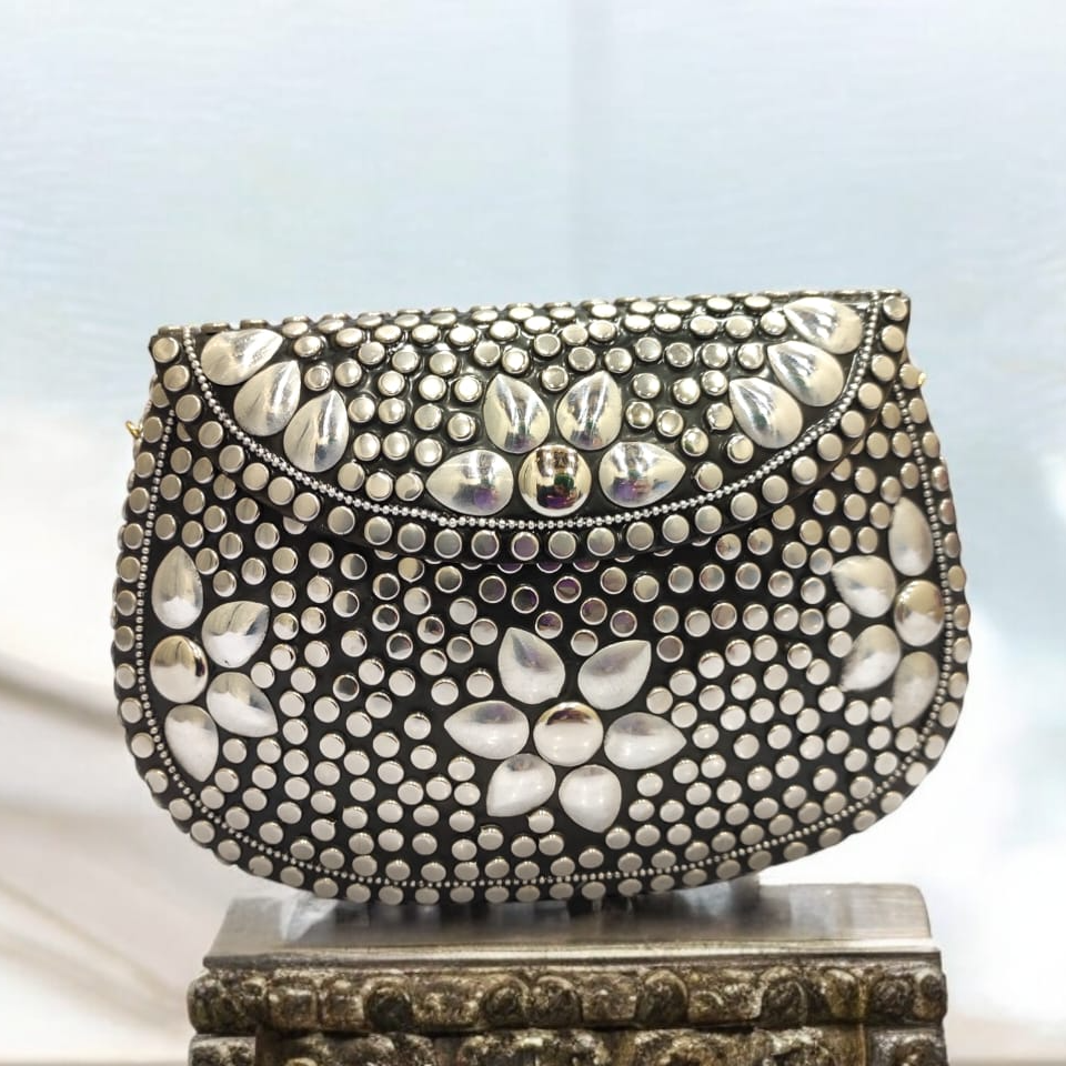 Metal Clutch Bags-https://s3.ap-south-1.amazonaws.com/prod-media-vyaparify-com/vcards/products/222911/product_1746877194_681f3b0ad0987.png Image