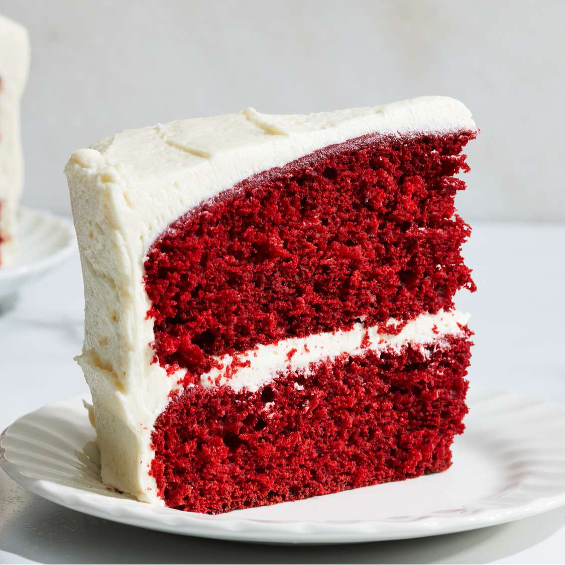 Red velvet cake with cheese cream-https://s3.ap-south-1.amazonaws.com/prod-media-vyaparify-com/vcards/products/225146/product_1747060121_68220599b9600.png Image