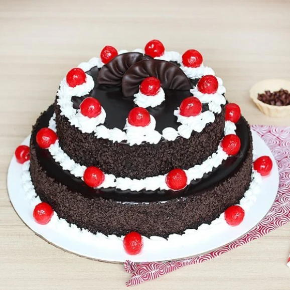 Black forest cake 1 pound-https://s3.ap-south-1.amazonaws.com/prod-media-vyaparify-com/vcards/products/225207/product_1747061923_68220ca36610d.png Image