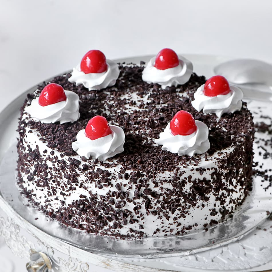 Black forest cake 1 pound-https://s3.ap-south-1.amazonaws.com/prod-media-vyaparify-com/vcards/products/225210/product_1747061923_68220ca3b62cd.png Image