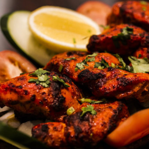 TANDOORI CHICKEN-https://s3.ap-south-1.amazonaws.com/prod-media-vyaparify-com/vcards/products/236498/product_1747418677_68277e3510e03.png Image