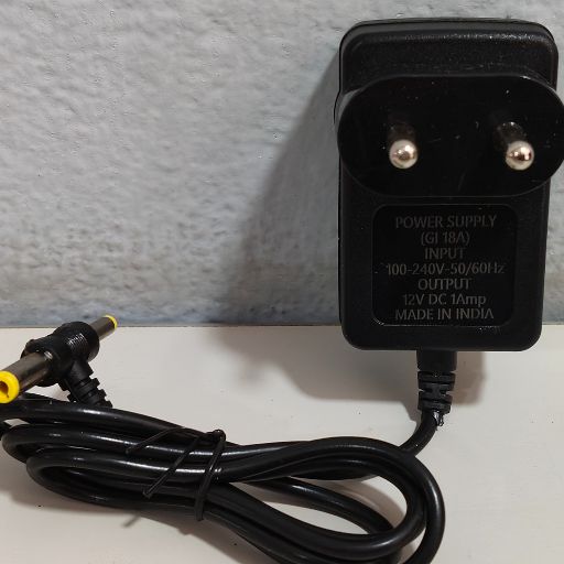 12V - 1A Adaptor-https://s3.ap-south-1.amazonaws.com/prod-media-vyaparify-com/vcards/products/288024/product_1749712420_684a7e24af990.png Image