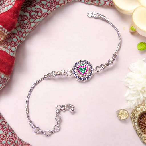 Silver Rakhi for Raksha Bandhan By Jauhari Jewellers-https://s3.ap-south-1.amazonaws.com/prod-media-vyaparify-com/vcards/products/305970/product_1752589081_687663199c644.png Image