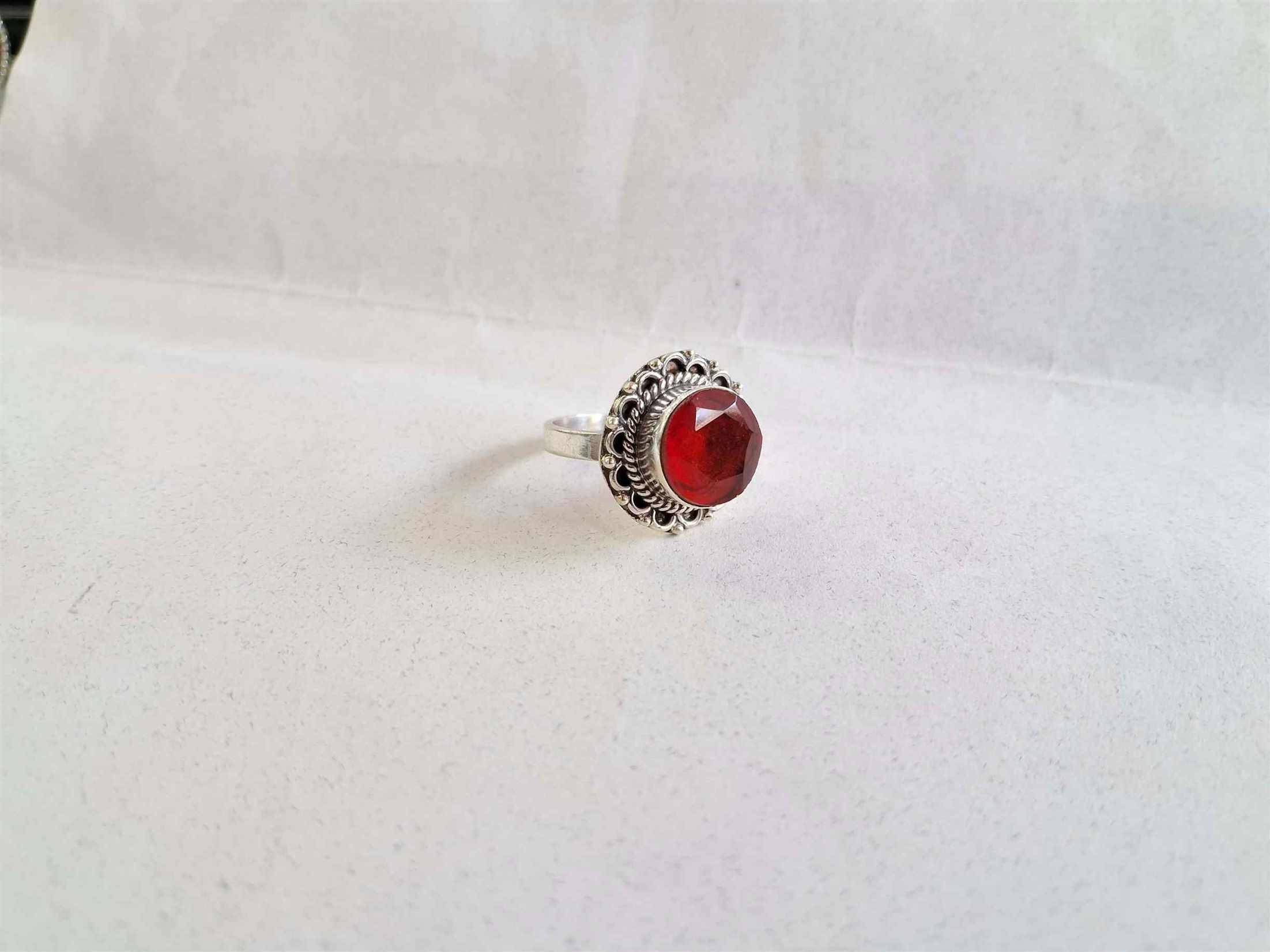 Silver Ring with Red Stone-https://s3.ap-south-1.amazonaws.com/prod-media-vyaparify-com/vcards/products/36530/Silver-Ring-with-Red-Stone.jpg Image