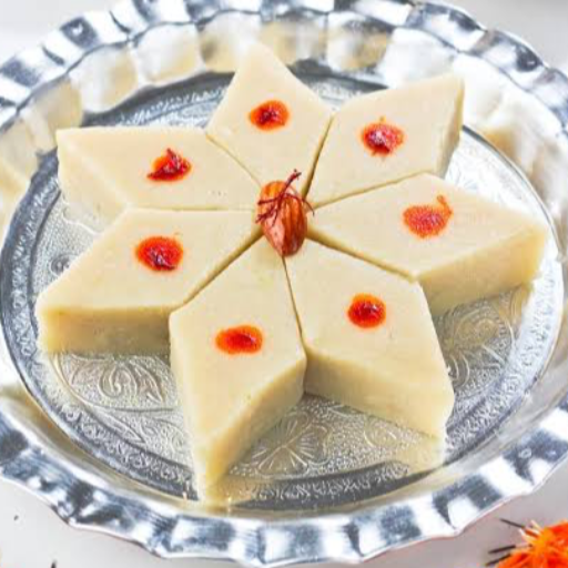Badam Barfi-https://s3.ap-south-1.amazonaws.com/prod-media-vyaparify-com/vcards/products/367004/product_1759128315_68da2afb6520f.png Image