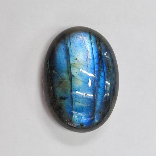 Natural Labradorite Stone-https://s3.ap-south-1.amazonaws.com/prod-media-vyaparify-com/vcards/products/379931/product_1760170197_68ea10d5af29e.png Image