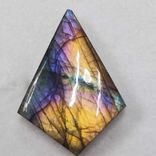 Natural Labradorite Stone-https://s3.ap-south-1.amazonaws.com/prod-media-vyaparify-com/vcards/products/379933/product_1760170197_68ea10d5dcfd7.png Image