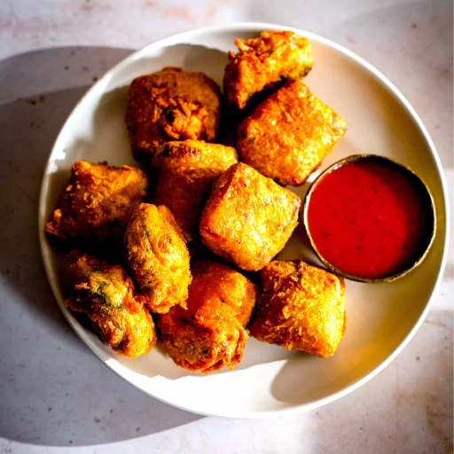 Paneer pakoda-https://s3.ap-south-1.amazonaws.com/prod-media-vyaparify-com/vcards/products/426665/product_1764054805_6925571543343.png Image
