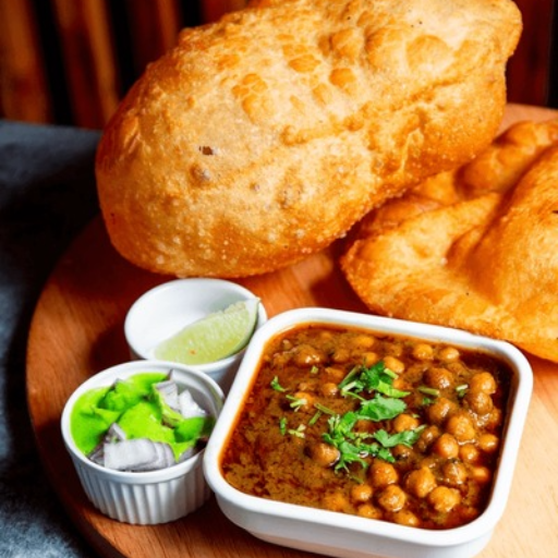Chhole bhature-https://s3.ap-south-1.amazonaws.com/prod-media-vyaparify-com/vcards/products/426839/product_1764058302_692564be587fe.png Image