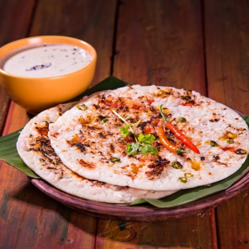 Onion dosa (Food)-https://s3.ap-south-1.amazonaws.com/prod-media-vyaparify-com/vcards/products/426939/product_1764060306_69256c9284f5d.png Image