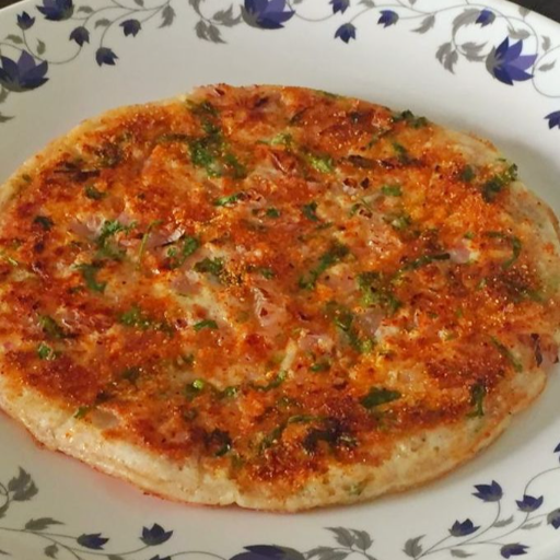 Tomato uttapam (south indian food)-https://s3.ap-south-1.amazonaws.com/prod-media-vyaparify-com/vcards/products/428104/product_1764141036_6926a7ece1fde.png Image