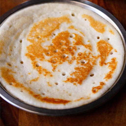 Plain uttapam-https://s3.ap-south-1.amazonaws.com/prod-media-vyaparify-com/vcards/products/428136/product_1764141603_6926aa2307079.png Image