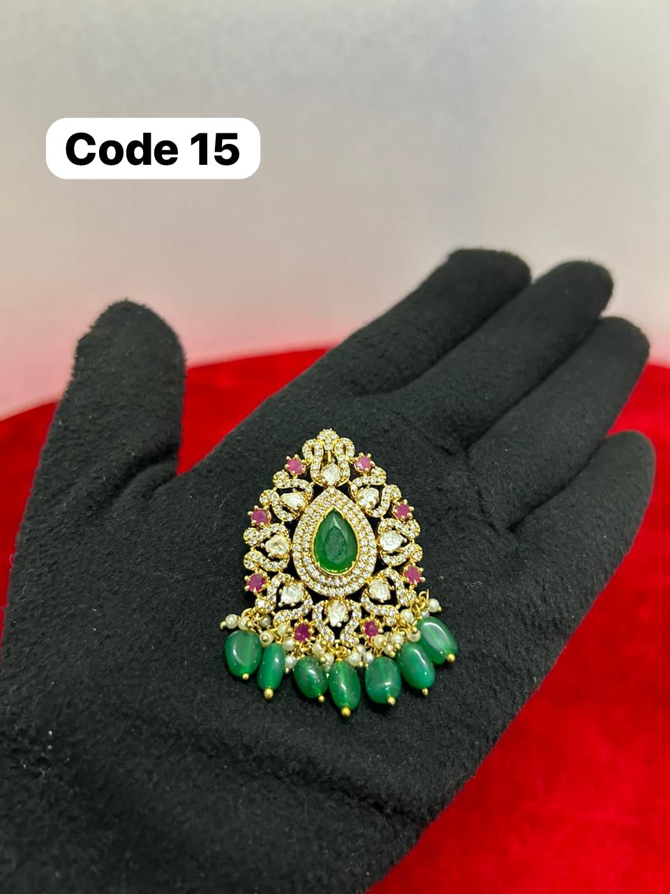 Panchaloha gem studded pendant-https://s3.ap-south-1.amazonaws.com/prod-media-vyaparify-com/vcards/products/69718/0a764167-7d1a-4380-bab5-df8487f23b7e.jpg Image