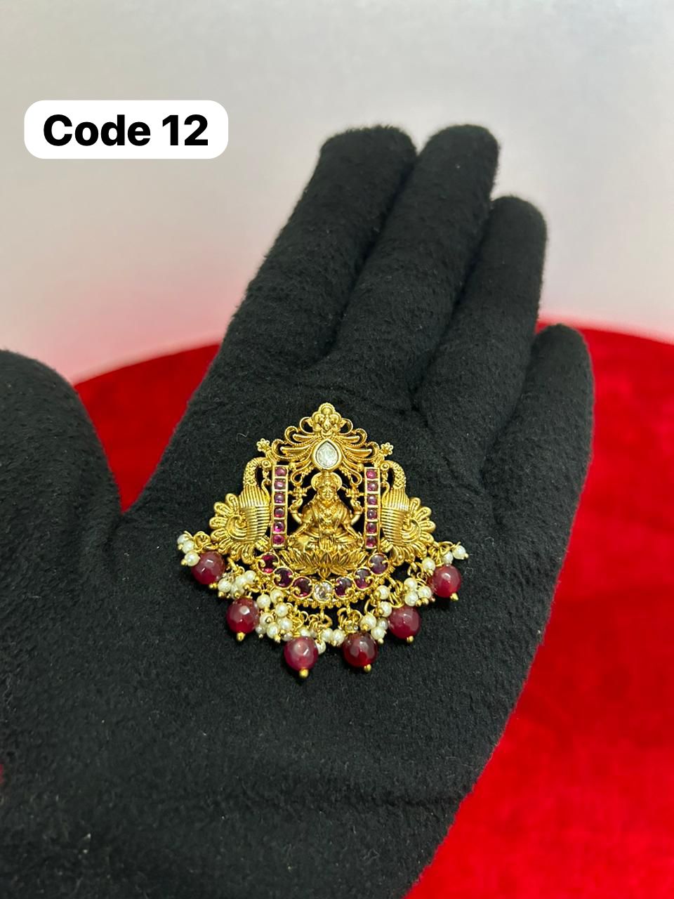 Panchaloha made gold polished pendant-https://s3.ap-south-1.amazonaws.com/prod-media-vyaparify-com/vcards/products/69720/c5df2961-6c92-43e5-ac05-1f51c9d2dde1.jpg Image