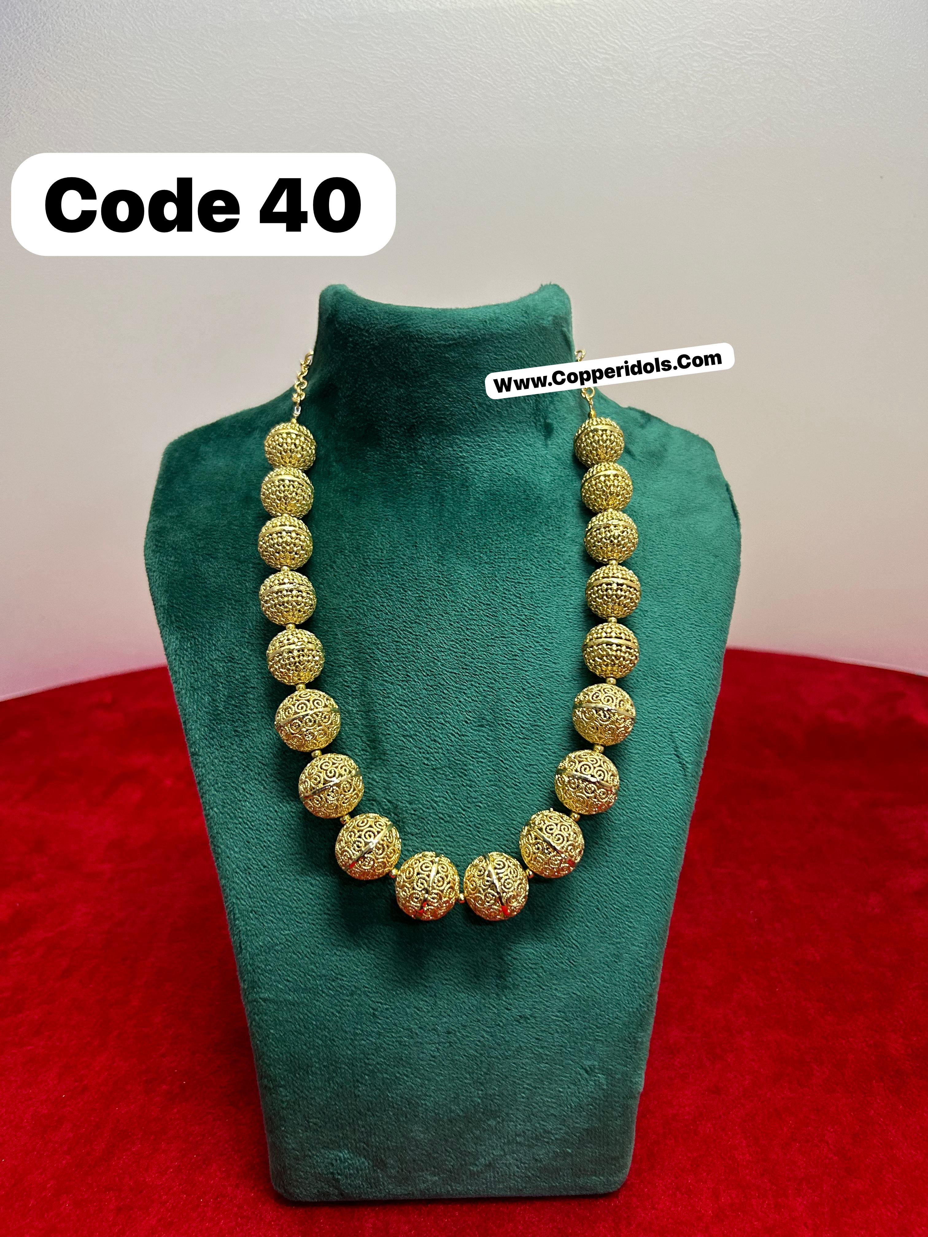 Panchaloha made gold polished necklace-https://s3.ap-south-1.amazonaws.com/prod-media-vyaparify-com/vcards/products/69747/b43b776f-17fd-46dc-ae0a-04657e41fab3.jpg Image