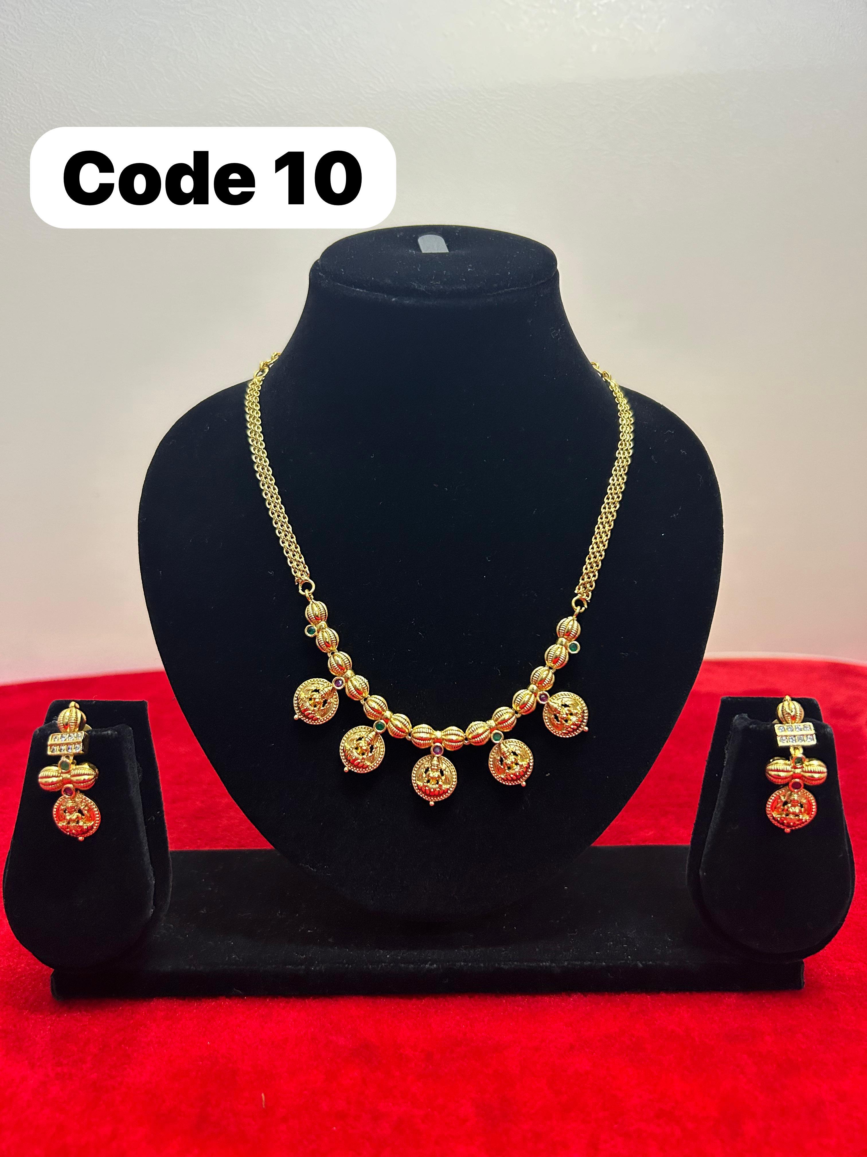 Panchaloha made gold polished necklace-https://s3.ap-south-1.amazonaws.com/prod-media-vyaparify-com/vcards/products/69888/cb5cb779-5d60-46f1-9c97-dc5d803c8772.jpg Image