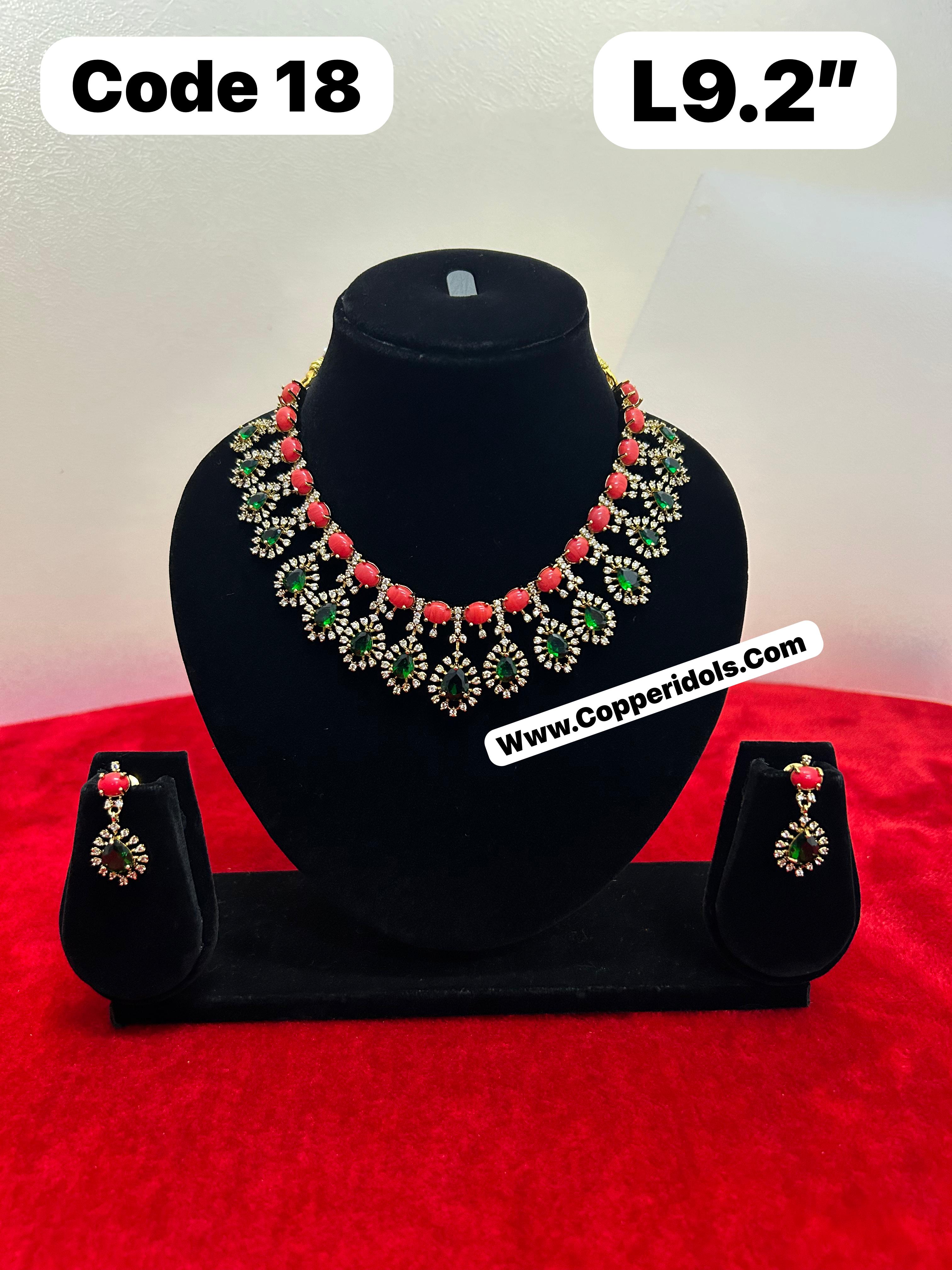 Panchaloha made gold polished green stone necklace for idols-https://s3.ap-south-1.amazonaws.com/prod-media-vyaparify-com/vcards/products/69910/f43d7677-11f4-4002-8046-6b32699589e1.jpg Image