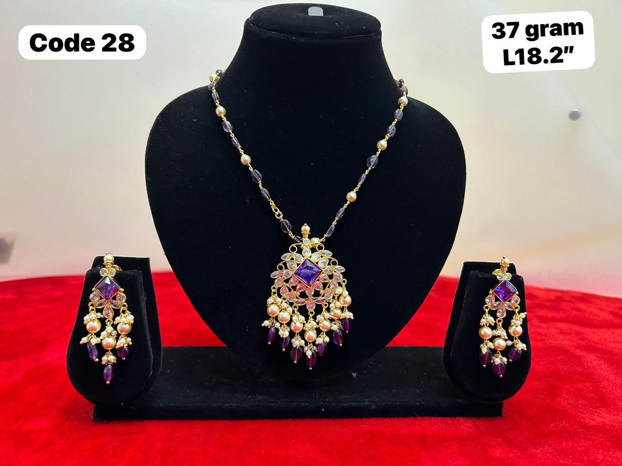 Panchaloha made gold polished pearls and blue stones along with earrings-https://s3.ap-south-1.amazonaws.com/prod-media-vyaparify-com/vcards/products/69927/859f034a-f3d2-452c-9a8e-fc124c83aa1d.jpg Image
