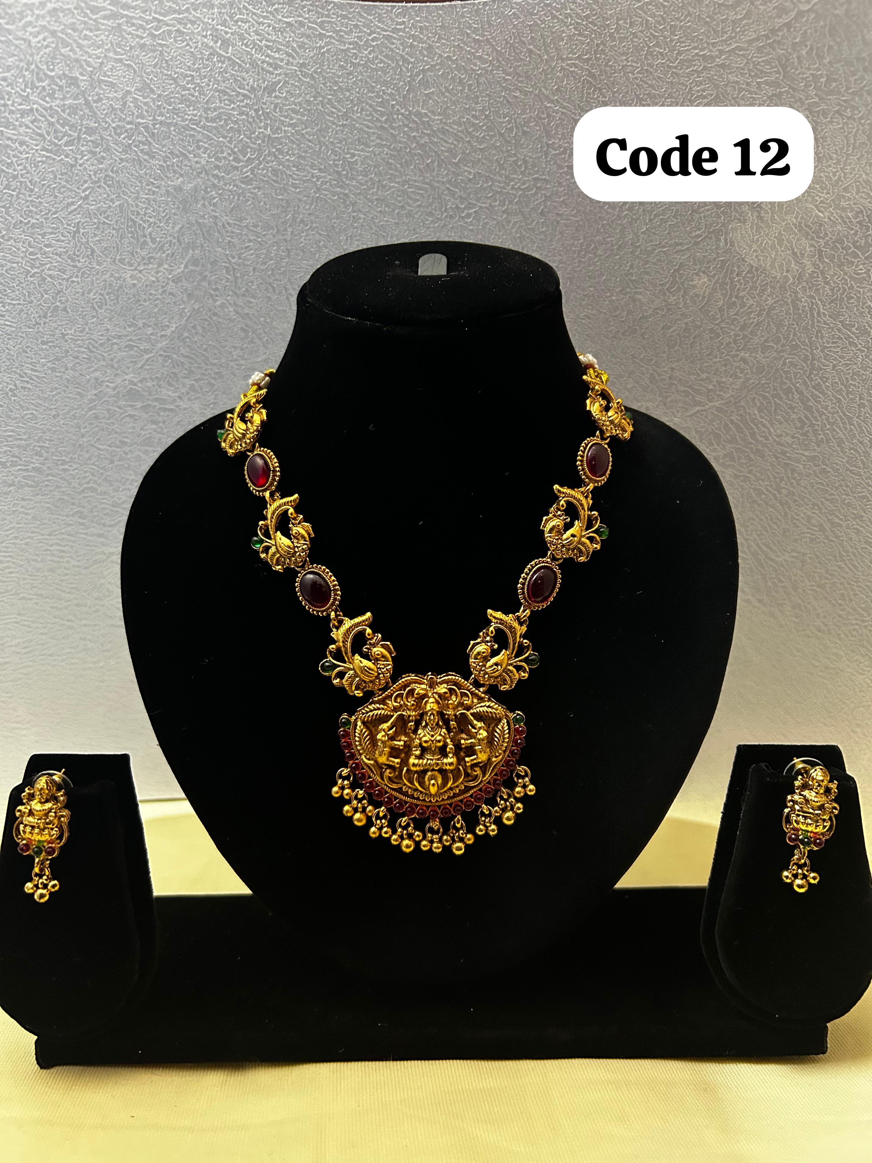 Panchaloha made gold polished gaja lakshmi pendant with earings-https://s3.ap-south-1.amazonaws.com/prod-media-vyaparify-com/vcards/products/70071/424342FD-116A-4CC0-B3E6-D10A120BF315.JPG Image