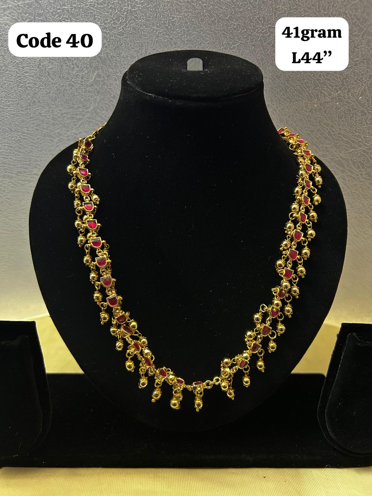 Panchaloha made gold polished beads and pink stone mala-https://s3.ap-south-1.amazonaws.com/prod-media-vyaparify-com/vcards/products/70084/fa5ab11a-af69-400b-88d5-44393085565a.jpg Image