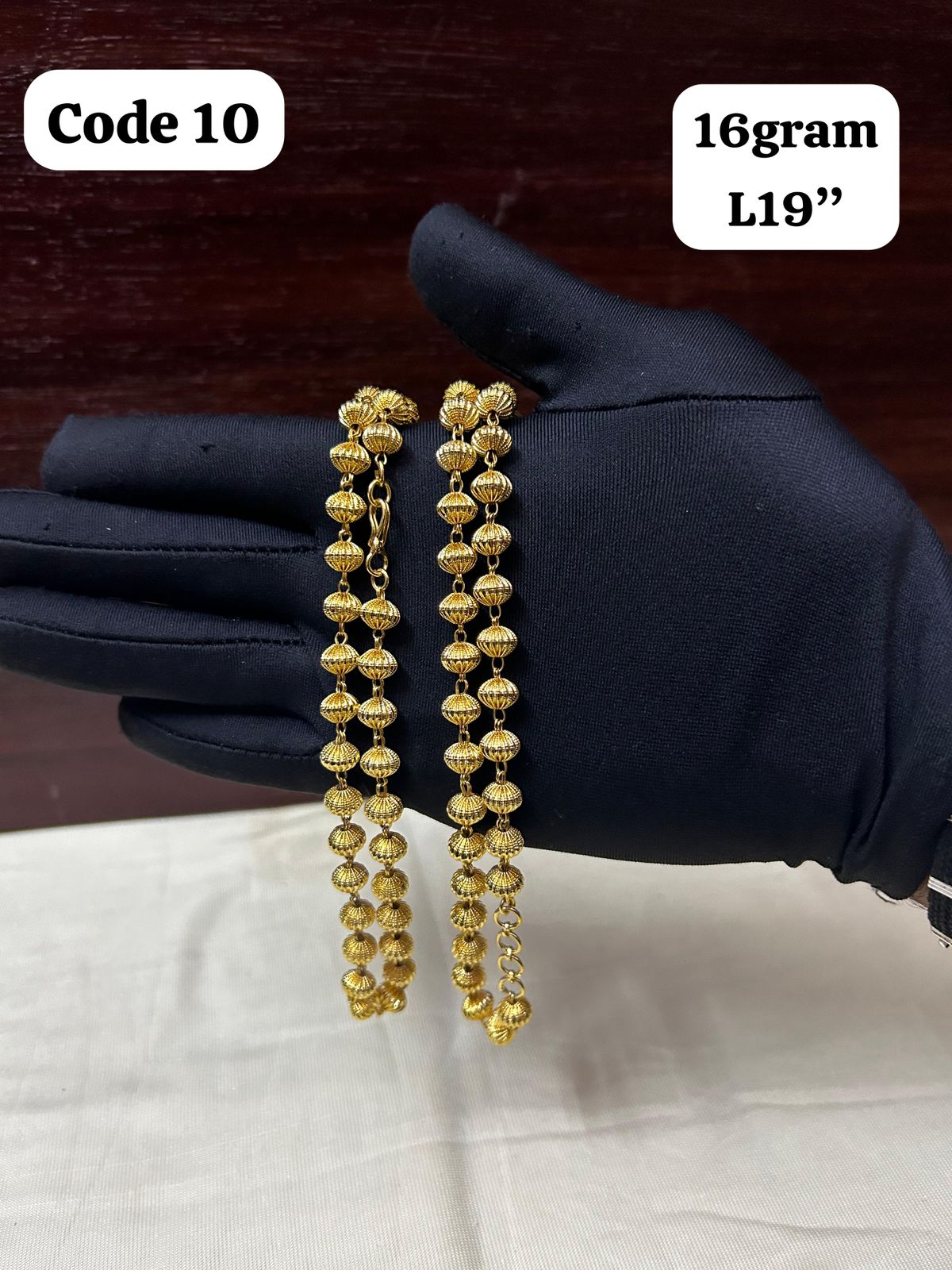 Panchaloha made gold polished gundu mala-https://s3.ap-south-1.amazonaws.com/prod-media-vyaparify-com/vcards/products/70085/bf252e3d-fdf1-458c-9a98-4b459ace8bcb.jpg Image