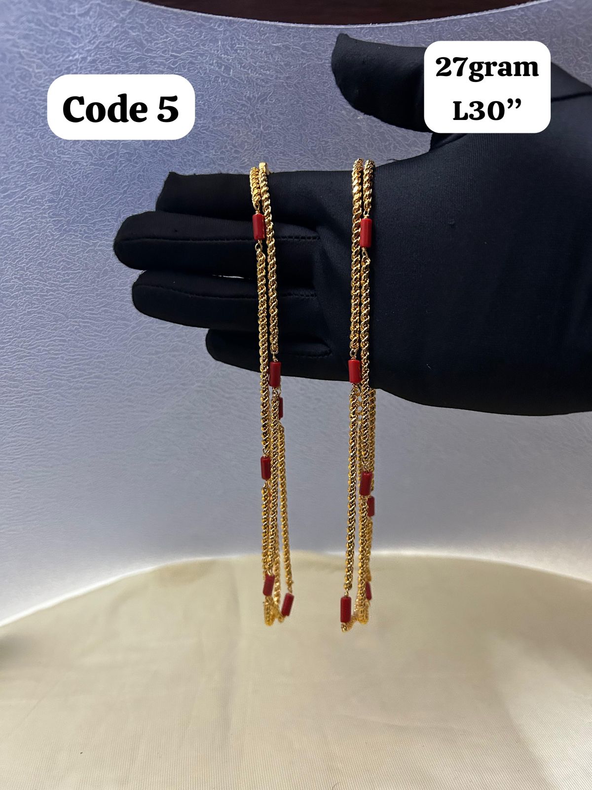 Panchaloha made gold polished chain with red beads-https://s3.ap-south-1.amazonaws.com/prod-media-vyaparify-com/vcards/products/70094/d159f171-da64-473f-9d5c-0698bfa261fc.jpg Image