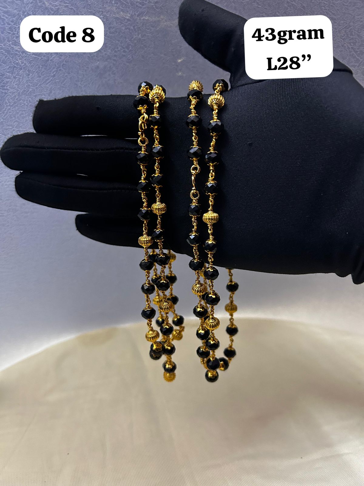 Panchaloha made gold polished gold gundu mala with black beads-https://s3.ap-south-1.amazonaws.com/prod-media-vyaparify-com/vcards/products/70097/9a0dea97-332e-4661-a0cd-8bd1defcd732-%282%29.jpg Image