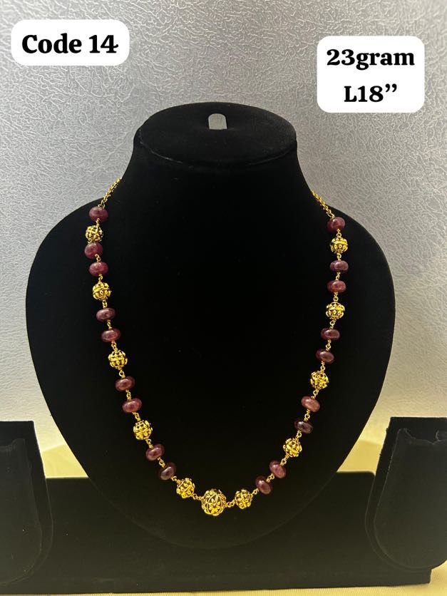 Panchaloha made gold polished gundu with red beads-https://s3.ap-south-1.amazonaws.com/prod-media-vyaparify-com/vcards/products/70272/32ed9aee-0910-44c9-98af-3f7b8c90fb12.jpg Image