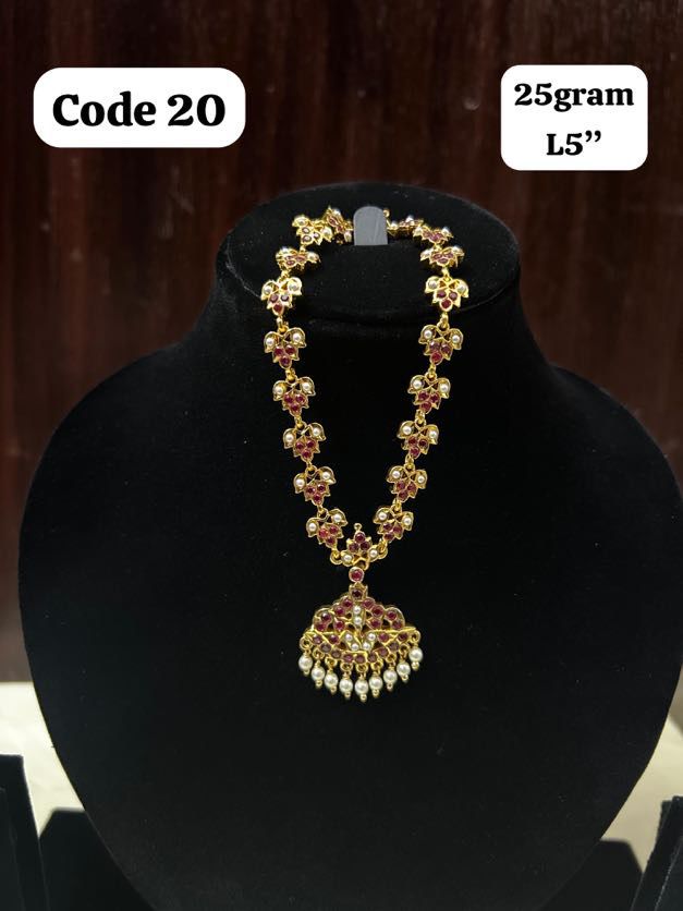 Panchaloha made gold polished red and white stones necklace-https://s3.ap-south-1.amazonaws.com/prod-media-vyaparify-com/vcards/products/70284/b0d9b081-3ace-41be-8fc2-19c967d13367.jpg Image