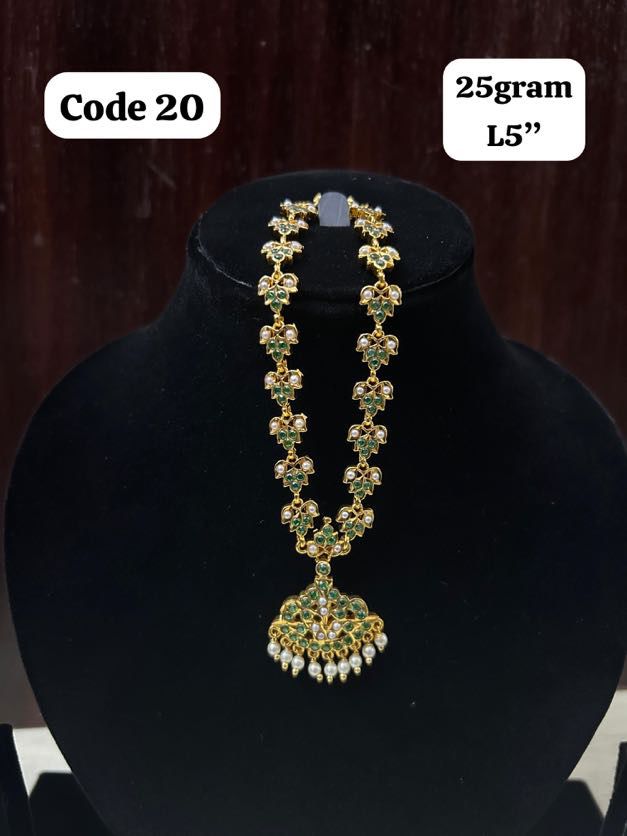 Panchaloha made gold polished with white and green stones necklace-https://s3.ap-south-1.amazonaws.com/prod-media-vyaparify-com/vcards/products/70286/263cd288-cf7c-403f-9ef4-f20e11a44970.jpg Image