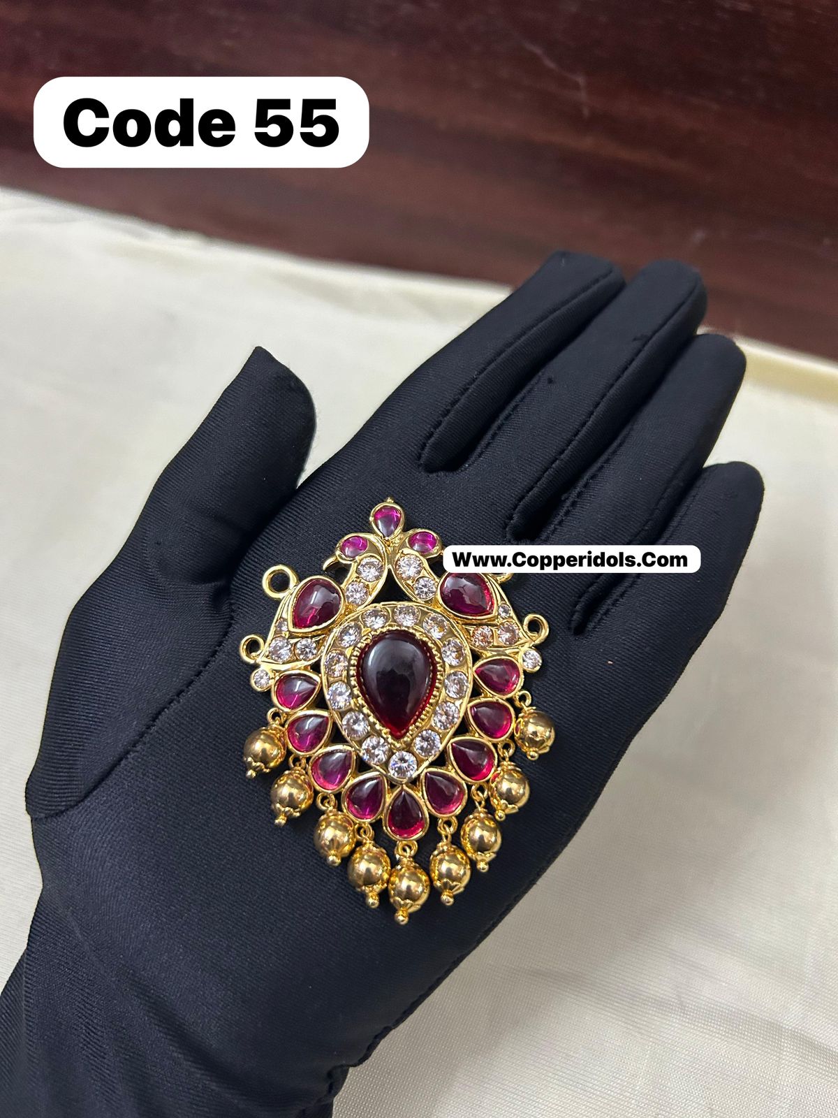 Panchaloha made gold polished gem studded pendant-https://s3.ap-south-1.amazonaws.com/prod-media-vyaparify-com/vcards/products/70309/32d63891-e369-4562-8657-8648cb1d6d88.jpg Image