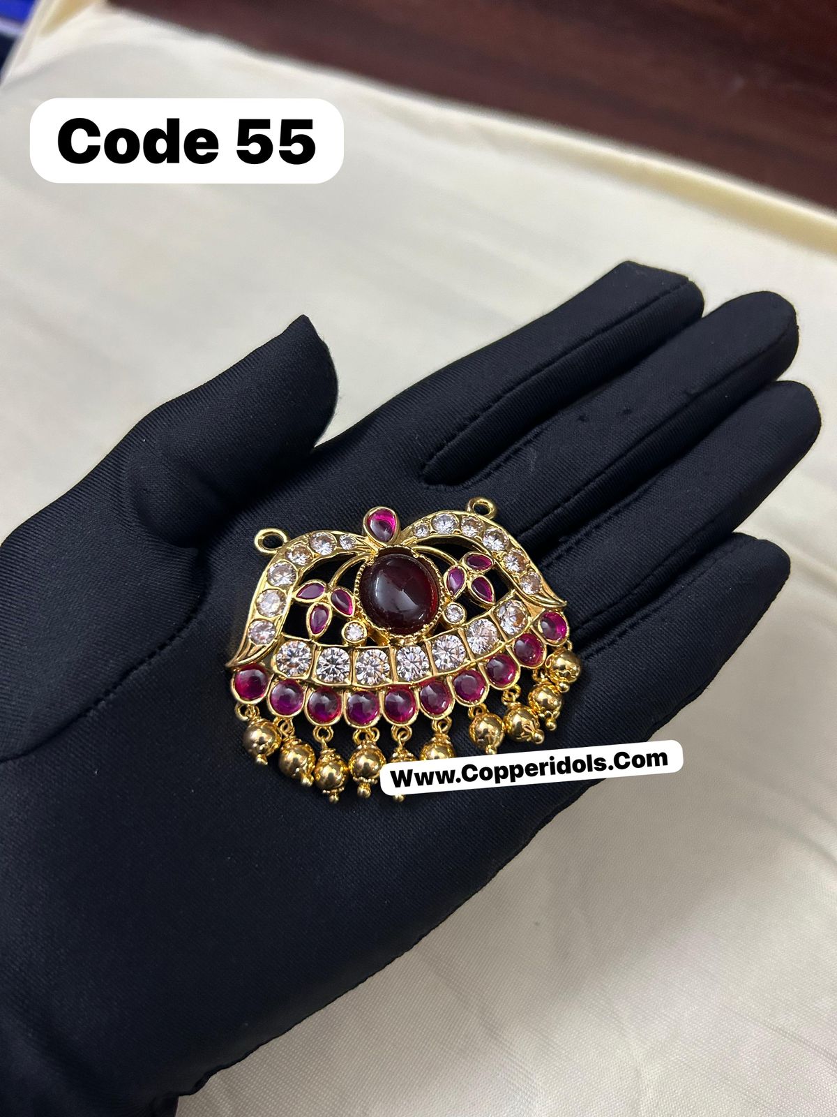 Panchaloha made gold polished gem studded kamala pendant-https://s3.ap-south-1.amazonaws.com/prod-media-vyaparify-com/vcards/products/70313/07b5fc52-edca-446c-b602-7413ab2ffd43.jpg Image