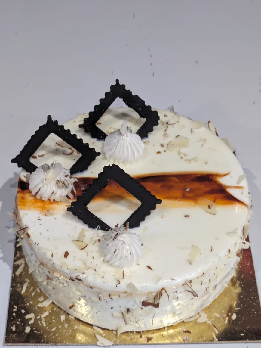 Badam mava cake-https://s3.ap-south-1.amazonaws.com/prod-media-vyaparify-com/vcards/products/98516/WhatsApp-Image-2024-12-07-at-2.58.08-PM.jpeg Image