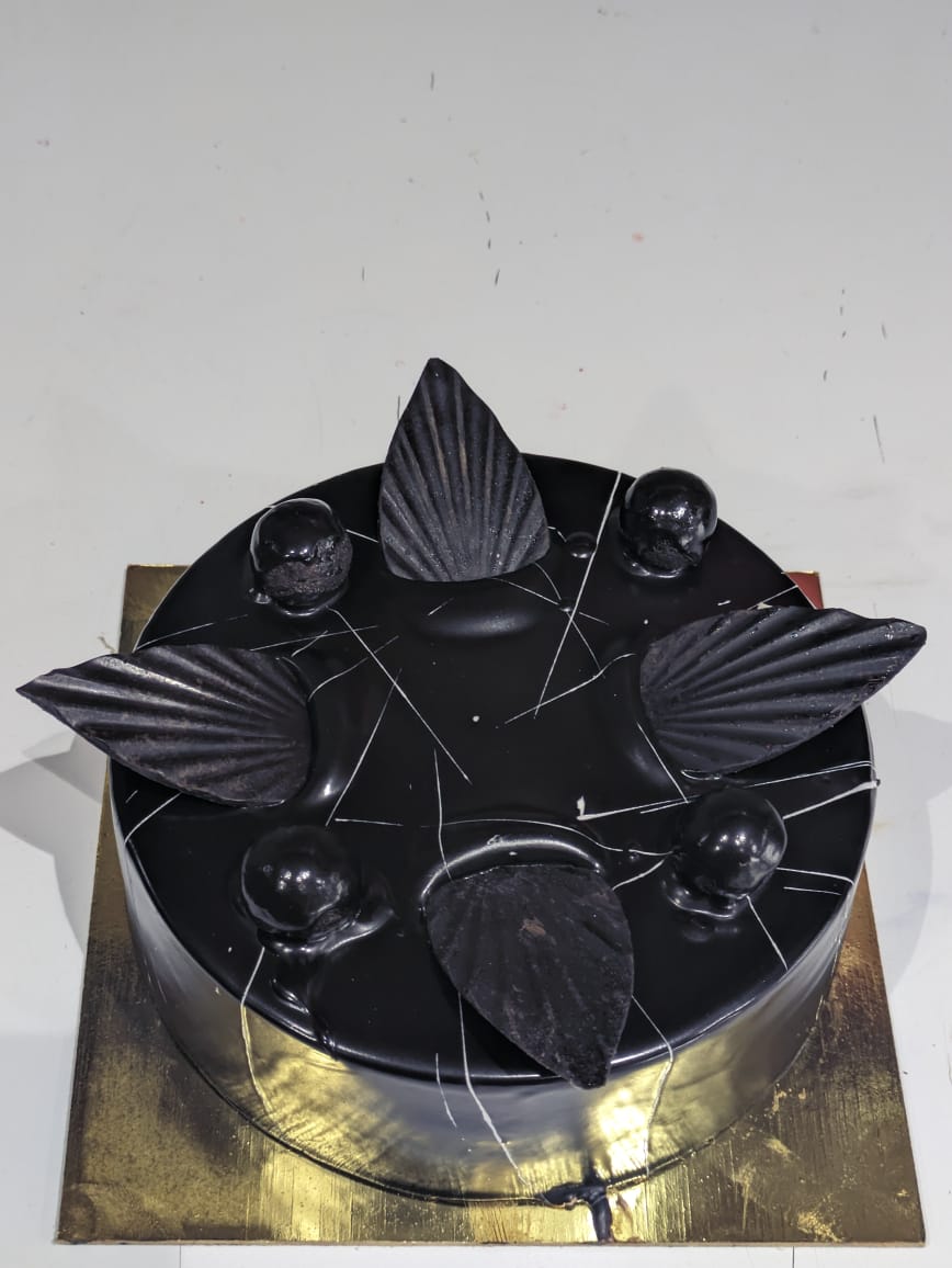 Chocolate marble cake-https://s3.ap-south-1.amazonaws.com/prod-media-vyaparify-com/vcards/products/98526/WhatsApp-Image-2024-12-07-at-2.56.42-PM.jpeg Image