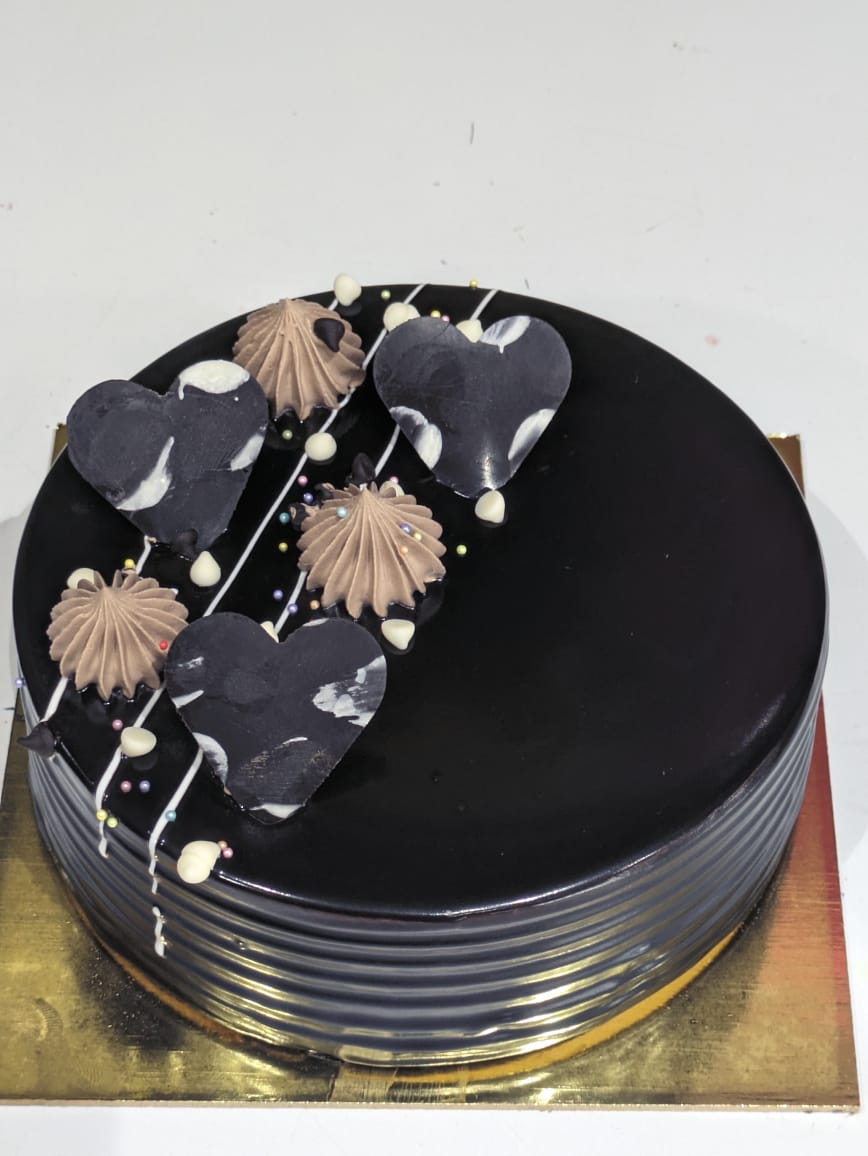 Chocolate chips cake-https://s3.ap-south-1.amazonaws.com/prod-media-vyaparify-com/vcards/products/98531/WhatsApp-Image-2024-12-07-at-2.55.29-PM.jpeg Image