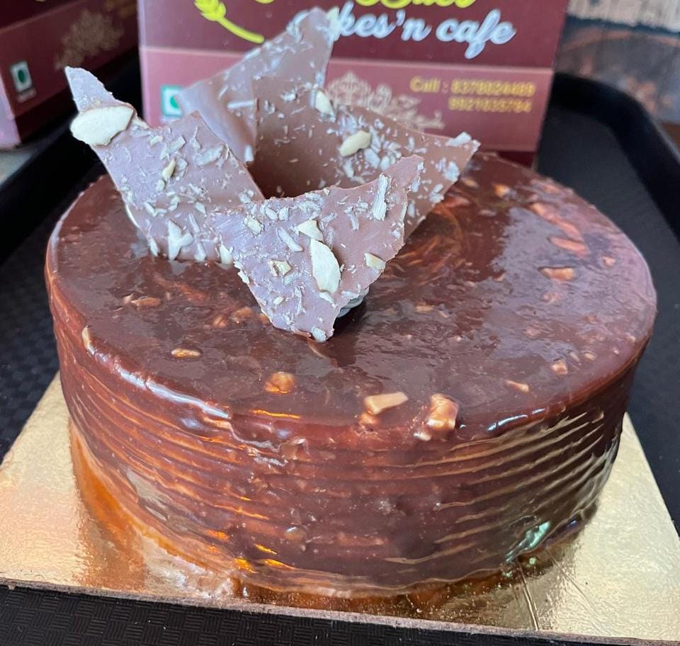  Chocolate hezalnut cake LOVE BITES CAKES N CAFE Shope No 3, Balaji Complex Near Jambhulkar Jym Sakhare Wasti Road Hinjewadi Pune