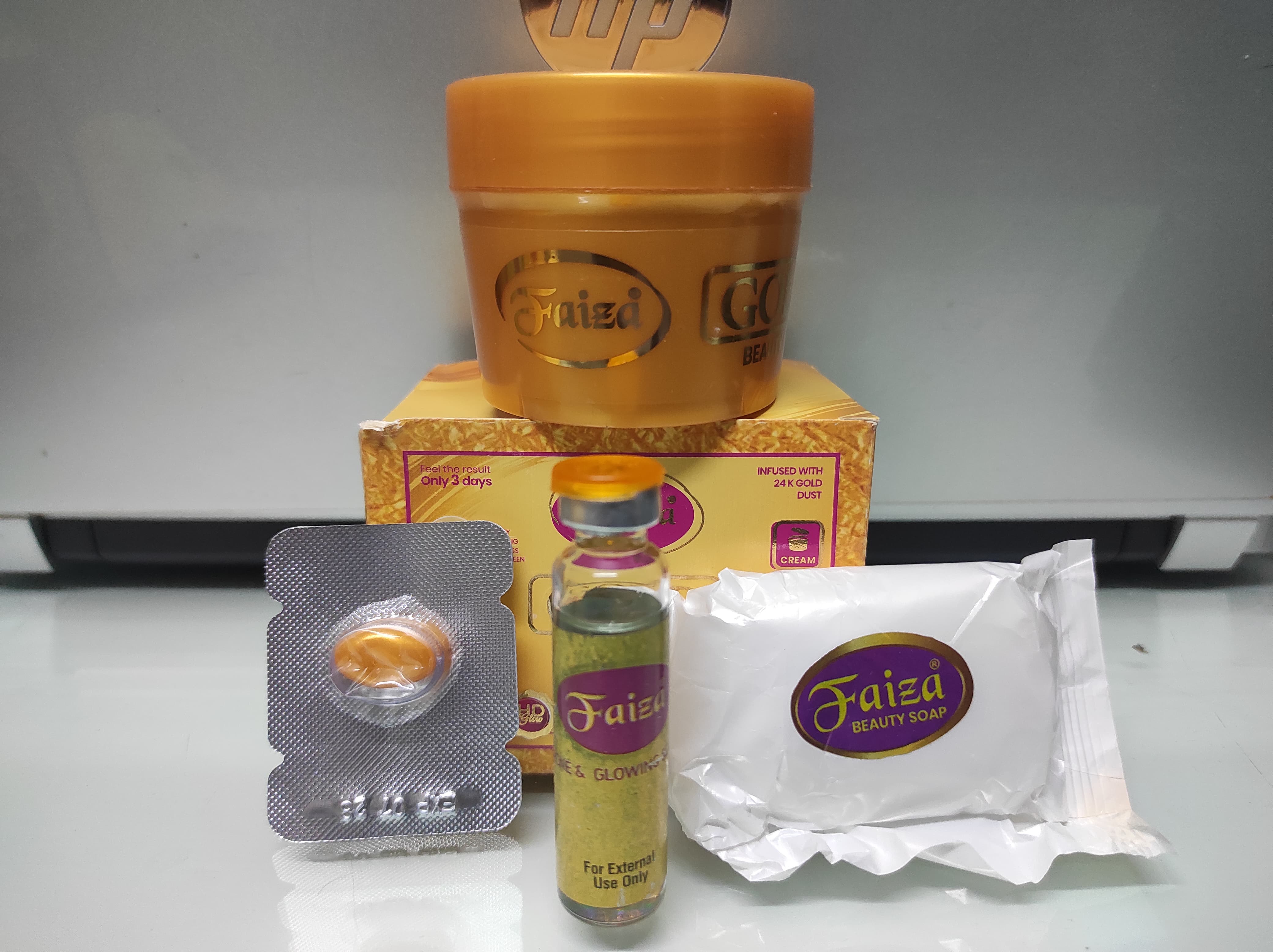 JESSY DISTRIBUTION PVT LTD | BUY 1 & GET 3- FAIZA GOLD BEAUTY CREAM, SERUM, VITAMIN E CAPSULE AND SOAP