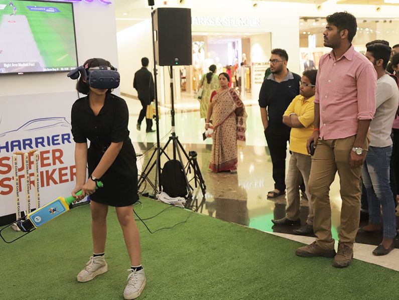 Girl Experiencing VR Cricket