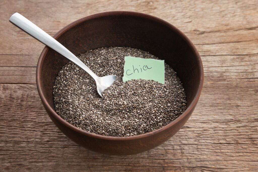 nutritious-chia-seeds-bowl-wooden-background.jpg